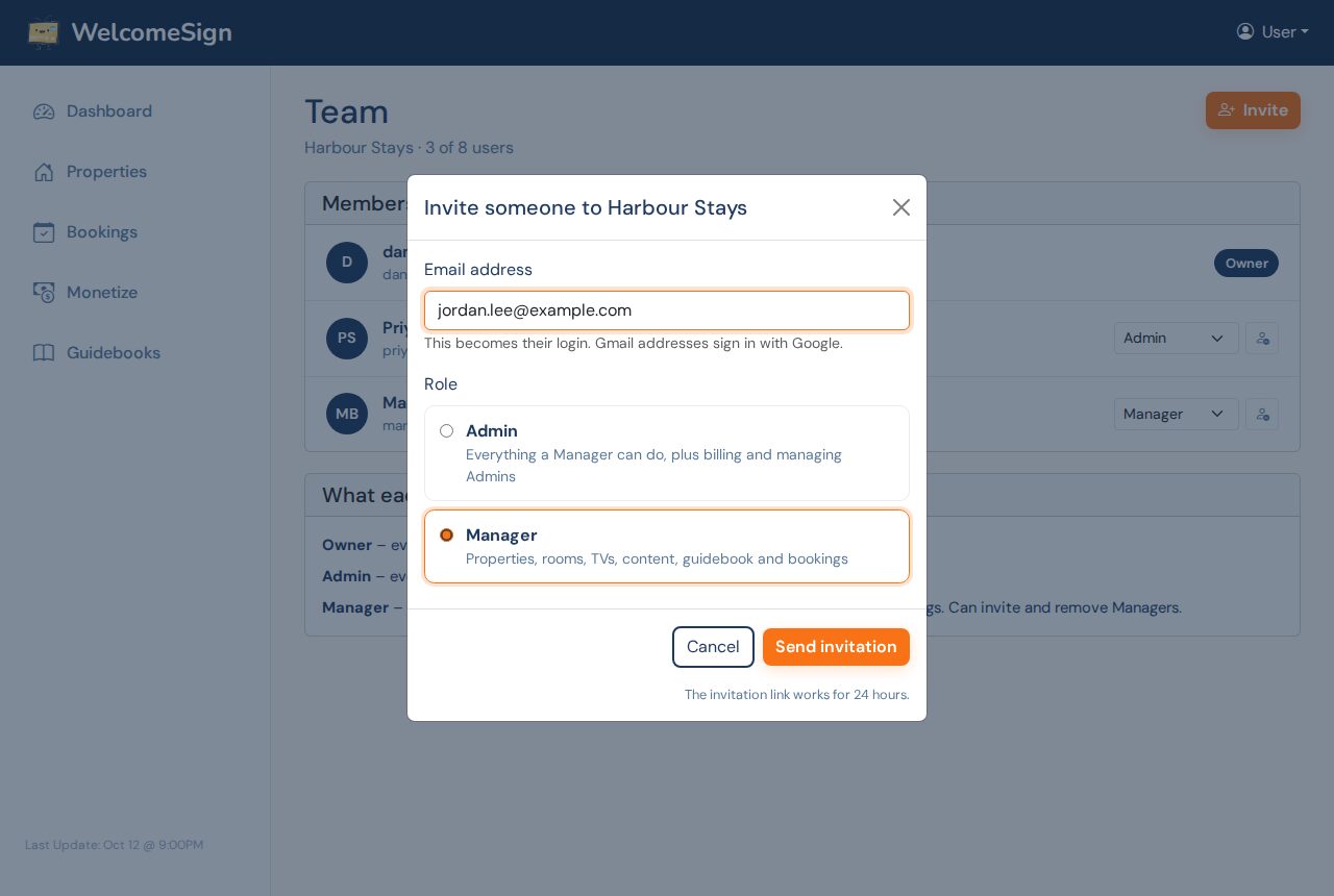 The Invite someone dialog with an email address field and a choice between the Admin and Manager roles
